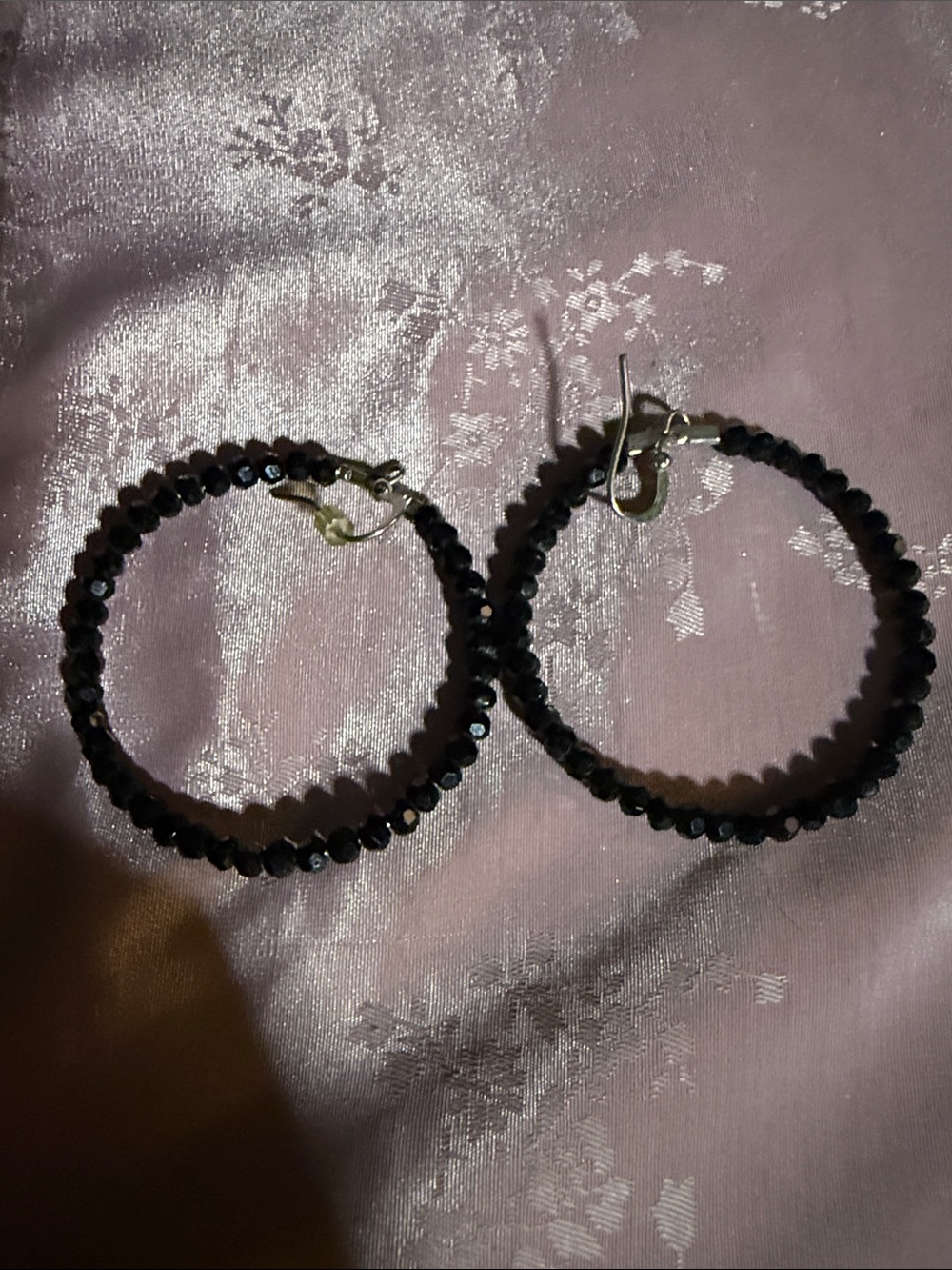 Black Beaded Hoop Earrings 
With fasted beads